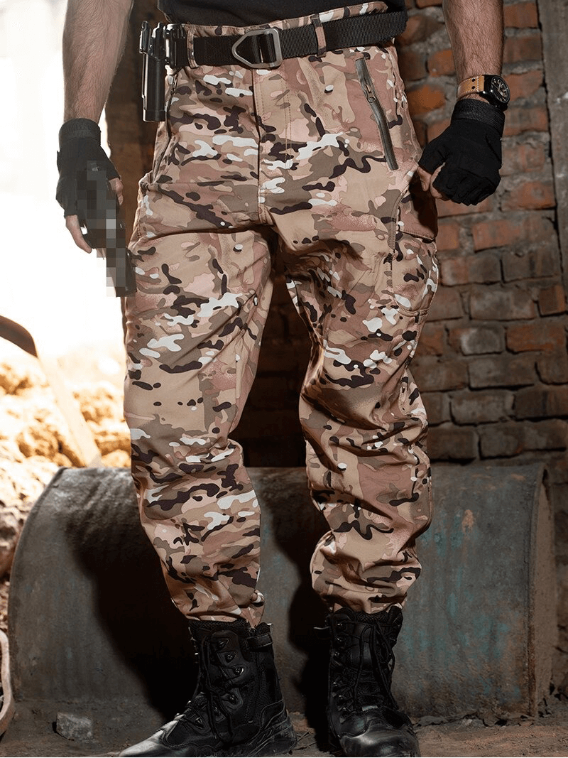 Camouflage tactical waterproof pants for men, perfect for military field use, featuring quick-dry and thermal technology.