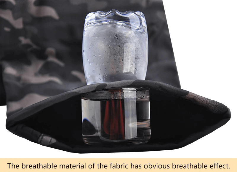 Tactical waterproof pants demo with breathable fabric showcasing water repellency and military style.