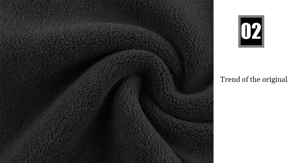 Close-up of black thermal fleece fabric highlighting texture and quality, ideal for motorcycle face mask and cycling neck scarf.