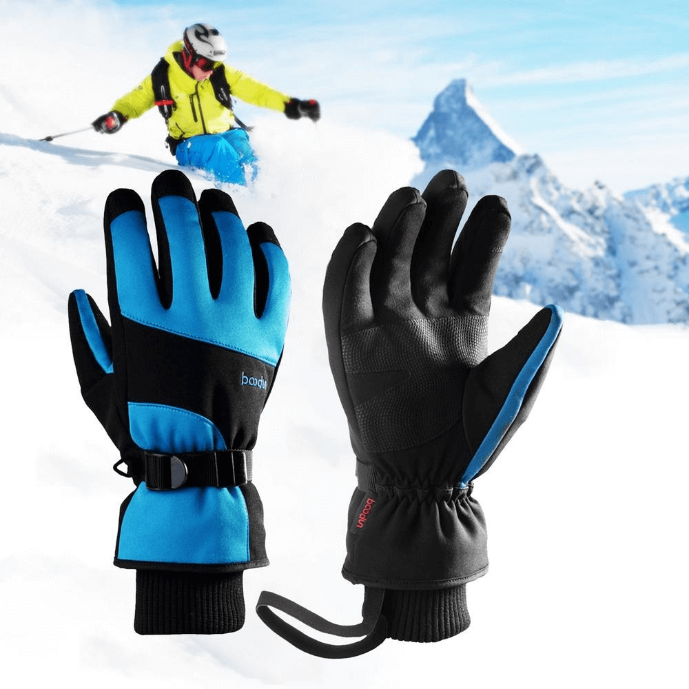 Skiing with Blue Thick Waterproof Mountaineering Gloves with Wrist Rope. Unisex design for cold outdoor adventures.