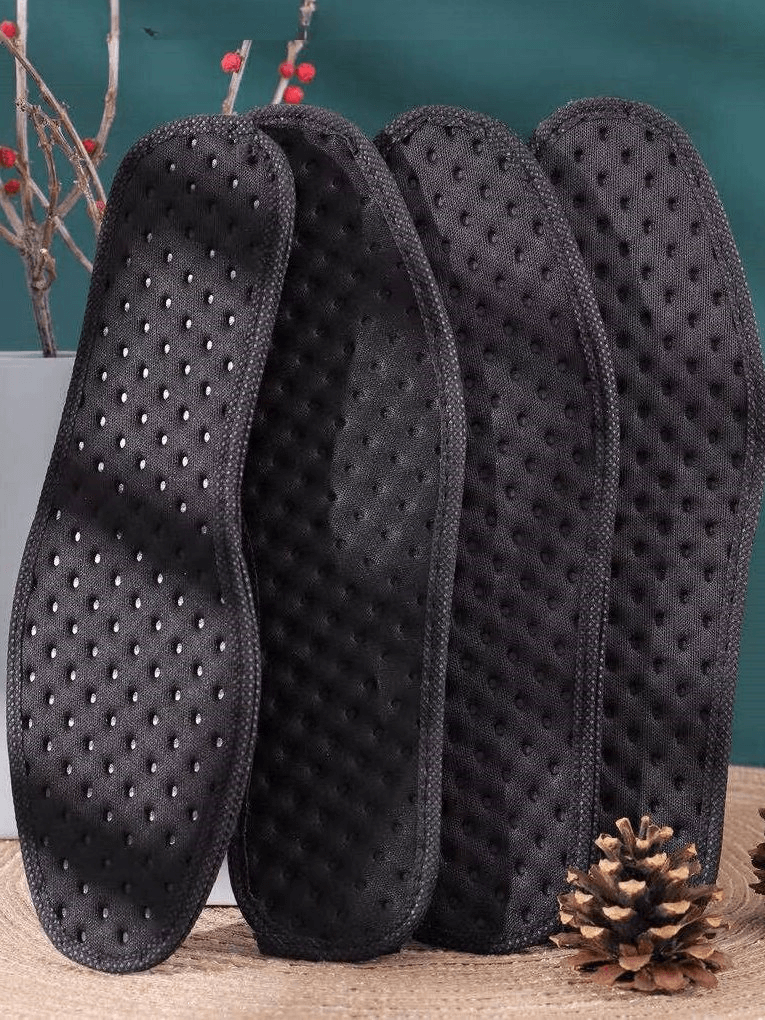 Thickened shock absorbing antibacterial insoles for sports shoes displayed upright, showcasing comfort and durability features.