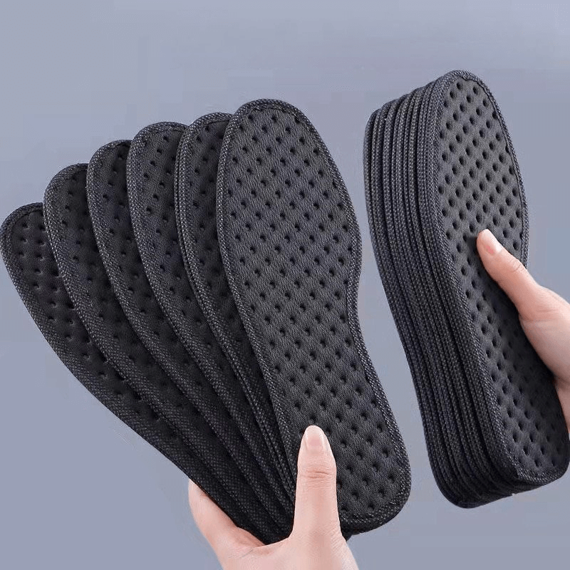 Stack of thickened shock absorbing antibacterial insoles for sports shoes, designed to enhance comfort, durability, and sweat absorption.