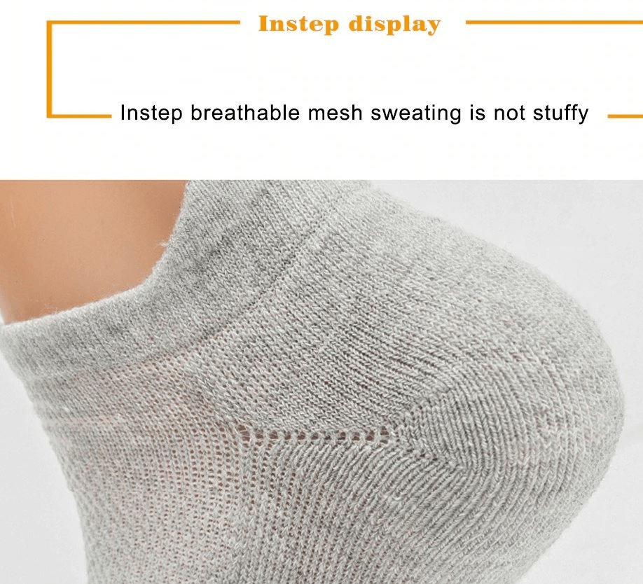 Close-up of grey thin sports breathable sock showcasing instep mesh design for enhanced ventilation, ideal for running. Unisex fit.