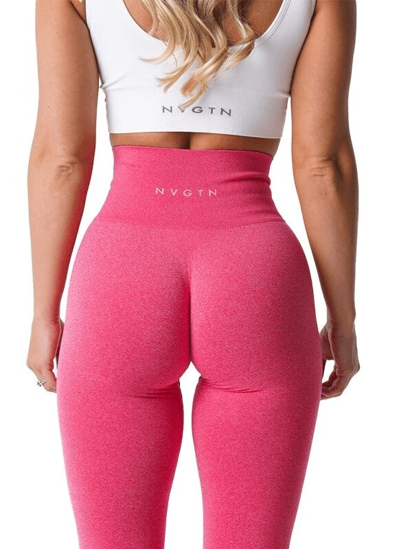 Woman wearing pink tight elastic sports leggings for fitness, showcasing comfort and support for active lifestyles.