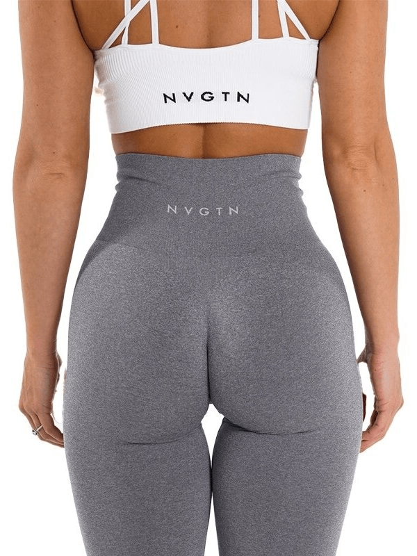 Back view of grey high-waisted sports leggings paired with a white sports bra, perfect for yoga and fitness activities.