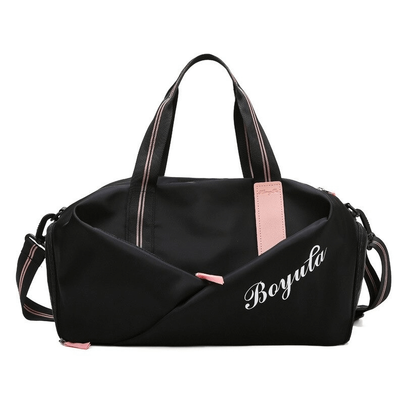 Black waterproof gym handbag with pink accents and crossbody strap, perfect for women's sports and outdoor activities.