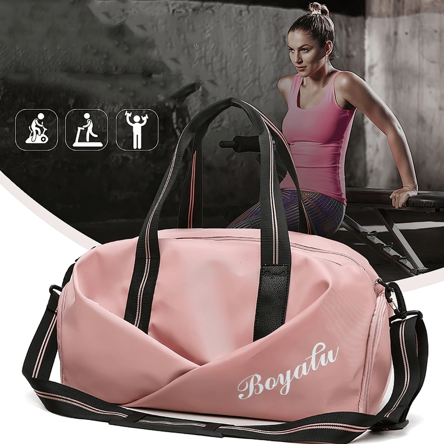 Pink waterproof crossbody gym bag for women with durable nylon and shoe pockets, ideal for outdoor sports and fitness activities.