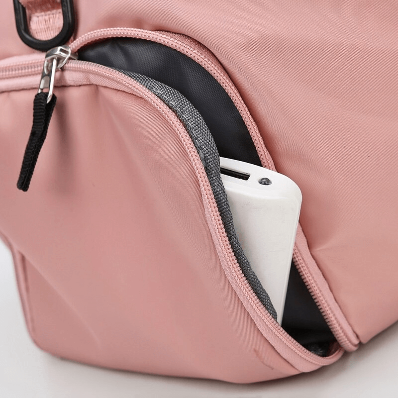 Training sports waterproof crossbody bag showing a convenient side pocket with zipper, perfect for organizing gym essentials.