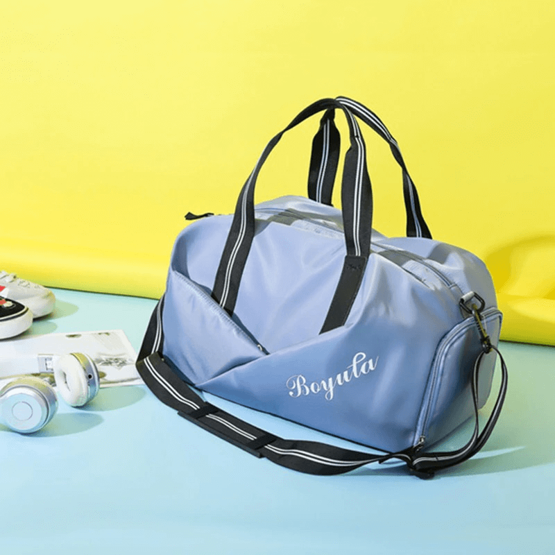 Training sports waterproof crossbody bag in light blue, perfect for gym or outdoor activities, featuring spacious compartments and durable straps.