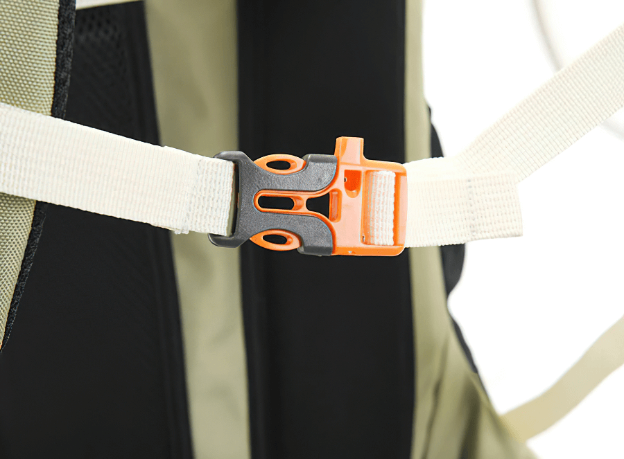 Close-up of a secure buckle on a travel backpack, showcasing durability and functionality.