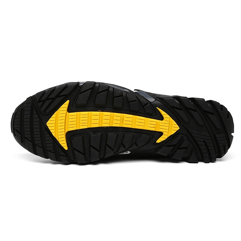 Sole of Trekking Flexible Hiking Boots SF0276 with yellow traction design and robust rubber grip for hiking.