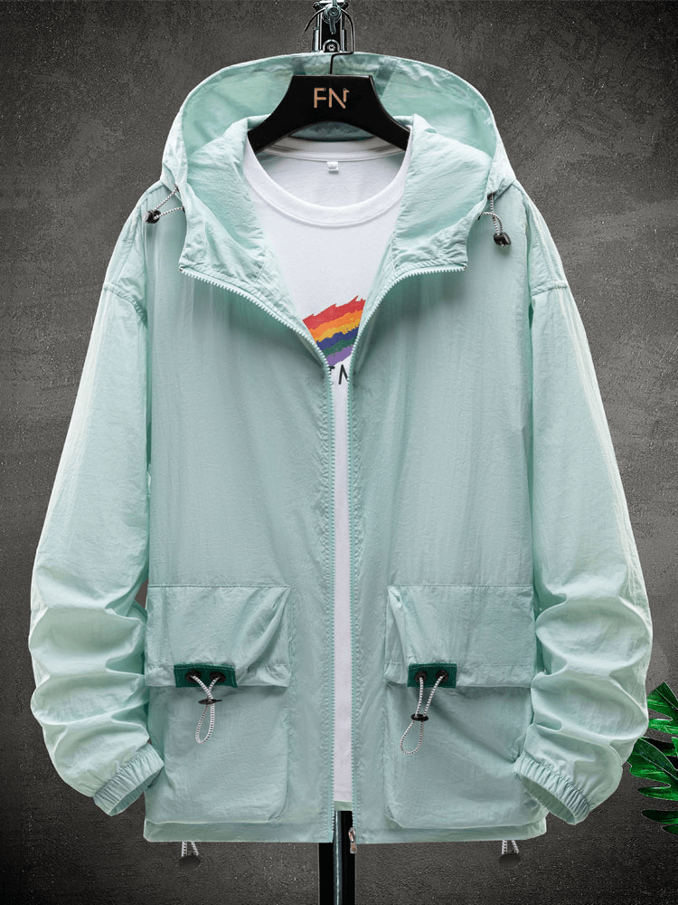 Mint green ultra-light multi-pocket waterproof windbreaker with hood, perfect for stylish protection against wind and rain.