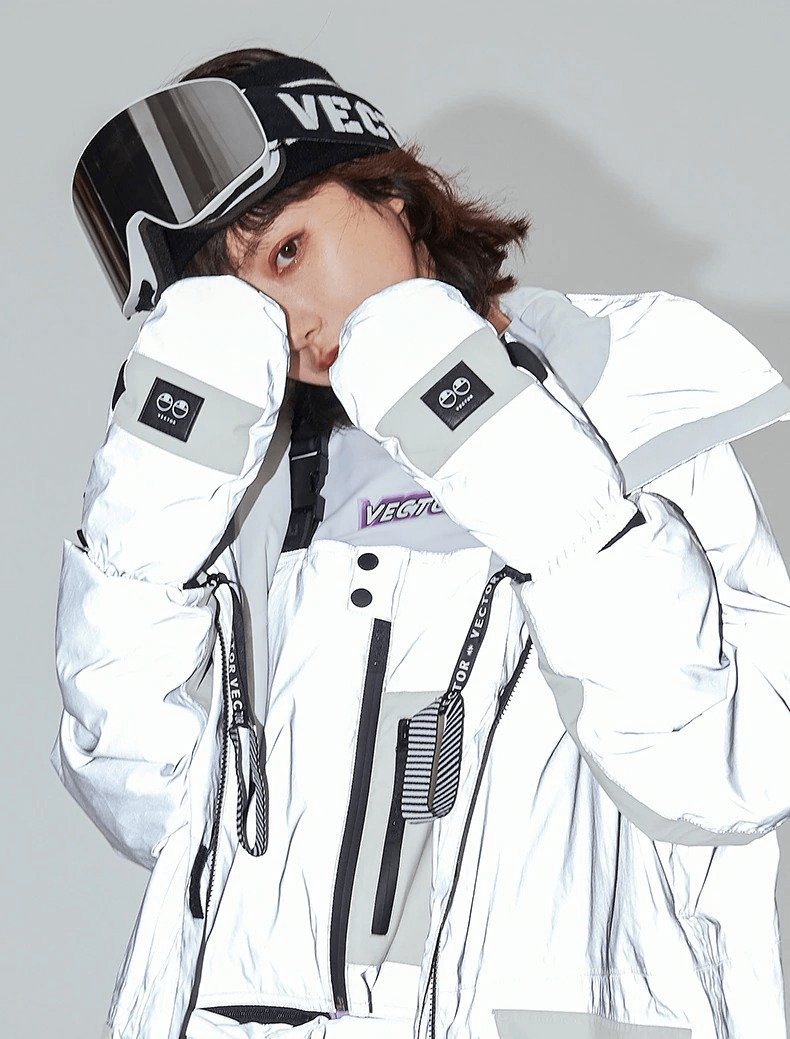 Woman wearing ultralight thickened waterproof ski gloves and gear, showcasing anti-slip design, ready for snowy adventure.