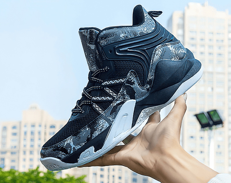 Unisex lace-up antiskid basketball shoe with cushioning and stylish design held against a city backdrop, featuring a breathable mesh upper.