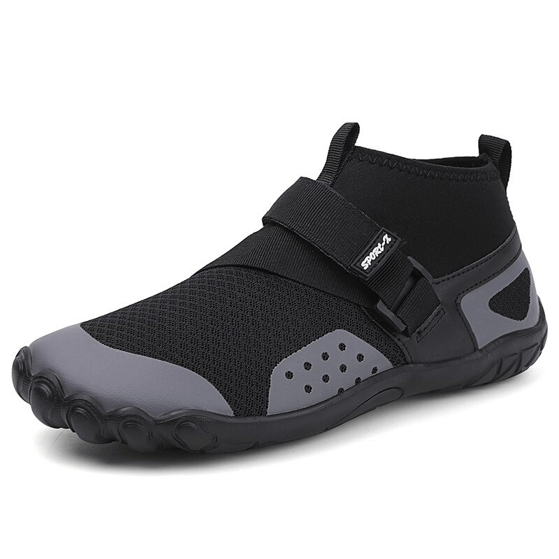 Unisex light water shoe with drainage holes in black and grey, featuring a breathable upper and TPR outsole for water activities.
