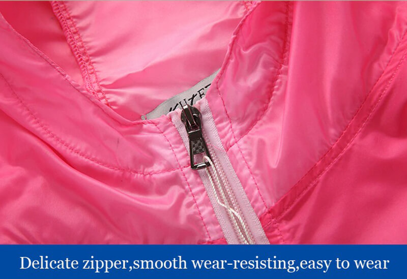 Close-up of pink windbreaker with smooth, wear-resistant zipper, highlighting easy-to-wear design.
