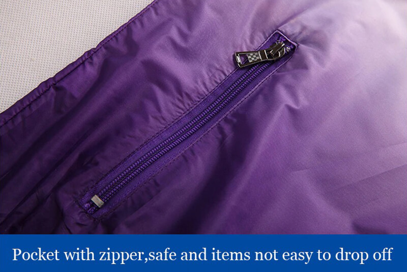 Purple windbreaker zippered pocket showing secure closure detail.