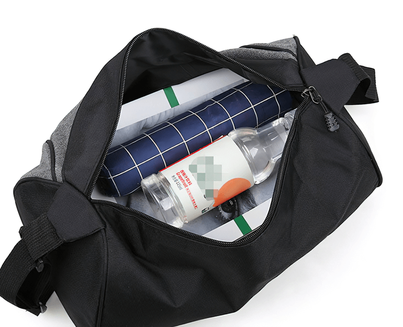 Open black unisex outdoor multifunction hiking sports bag with visible contents including a bottle and rolled items inside.