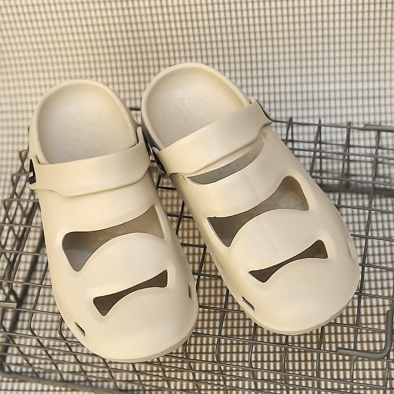 Unisex soft hollow clogs slippers in beige, featuring EVA upper and rubber outsole for outdoor comfort.