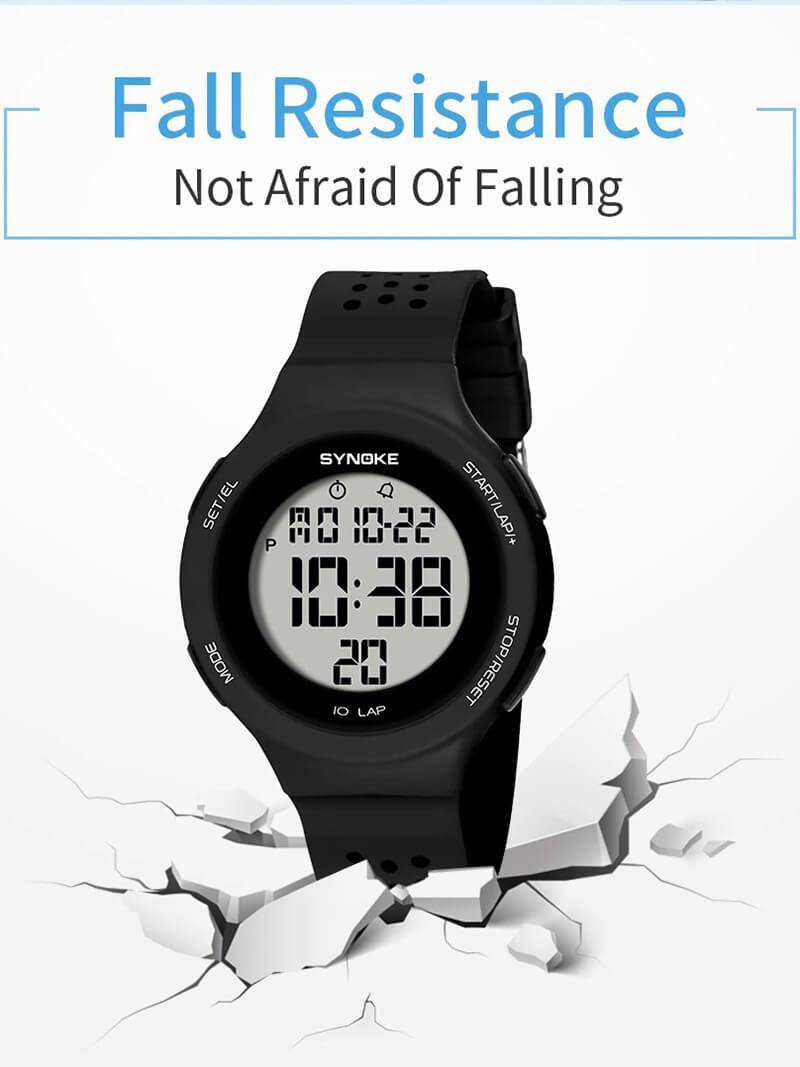 Unisex ultra-thin digital watch with LED display showing fall resistance on cracked surface.