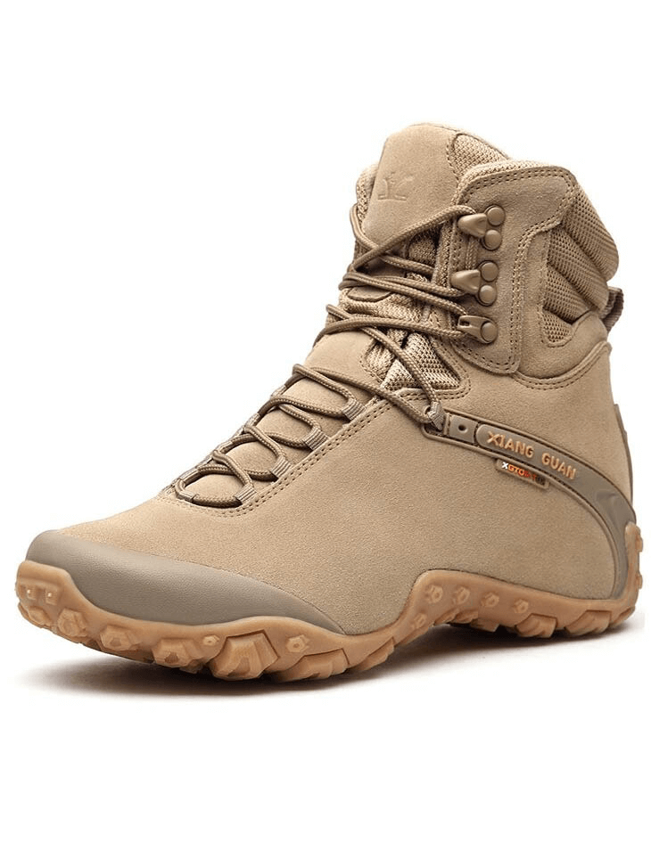 High cut hiking boots with lace-up design, genuine leather, and waterproof features in a neutral color for outdoor adventures.