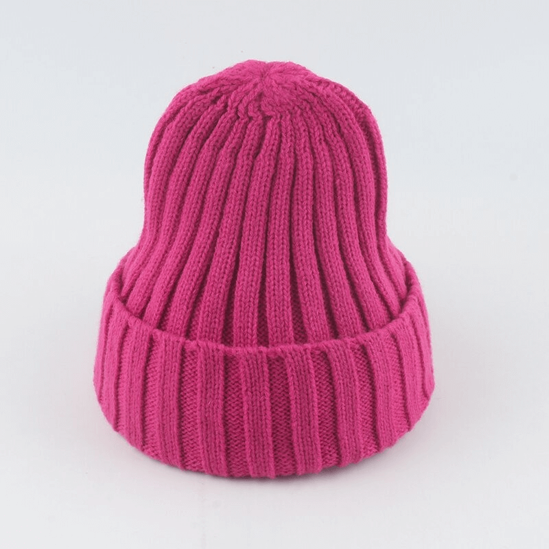 Bright pink warm plain soft knitted hat, unisex casual style, solid color, ready to keep you cozy and stylish. Perfect for cold weather.