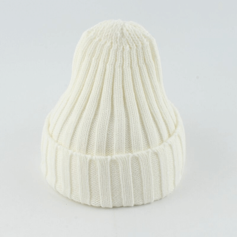 Cream-colored warm plain soft knitted hat for women and men, unisex style, casual solid pattern, cozy winter accessory.