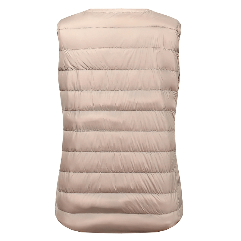 Back view of warm solid women's vest with pockets, oversized ultra-light outwear in beige, featuring a quilted design and zipper closure.
