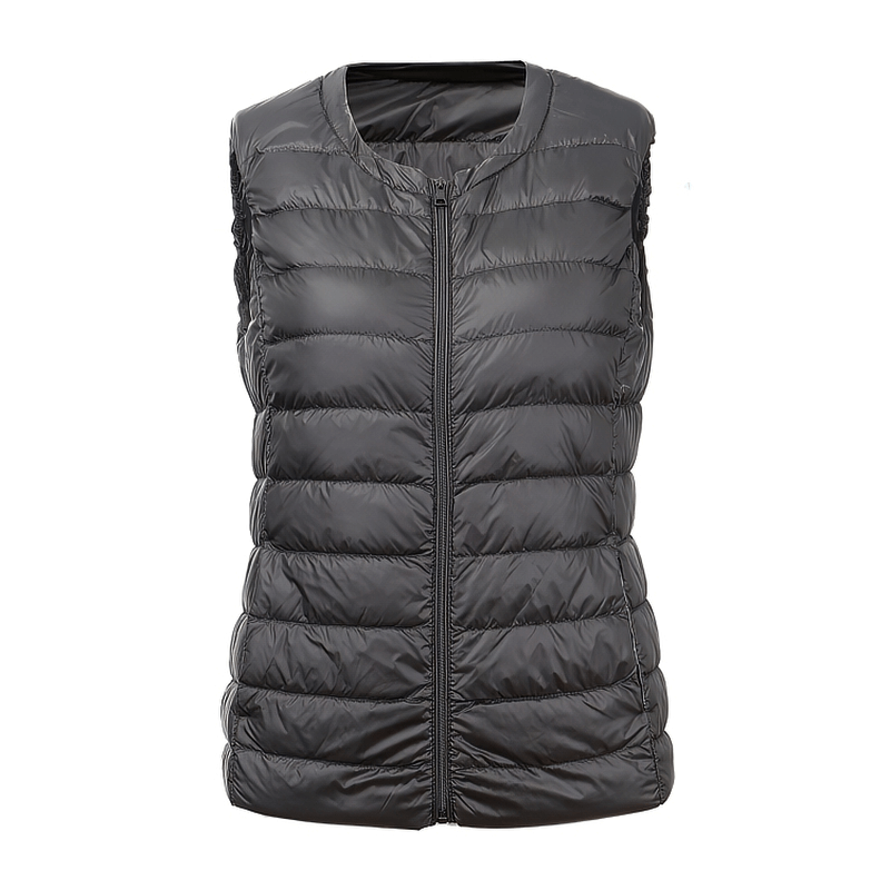 Warm solid women's vest with pockets, oversize ultra-light female outwear, sleek black vest with zipper and cozy filling.