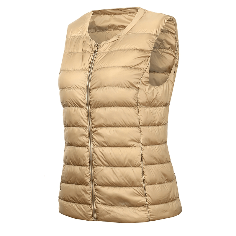 Warm solid women's vest with pockets, beige, ultra-light and oversized design, made of polyester and cotton with zipper closure.