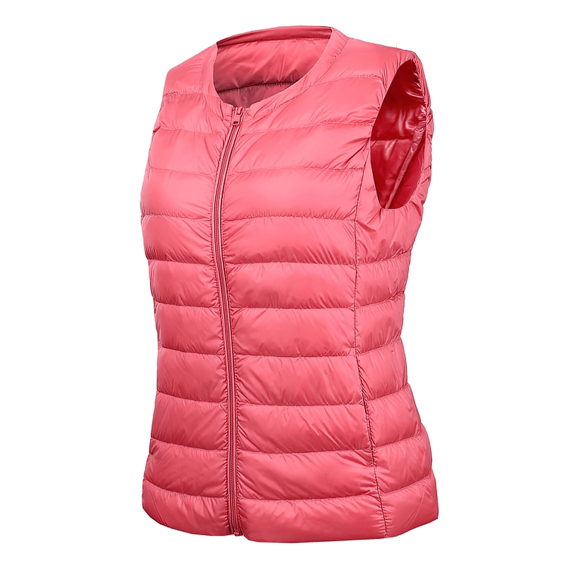 Warm solid pink women's vest with pockets, ultra-light oversized outwear, featuring zipper closure. Perfect for stylish comfort.