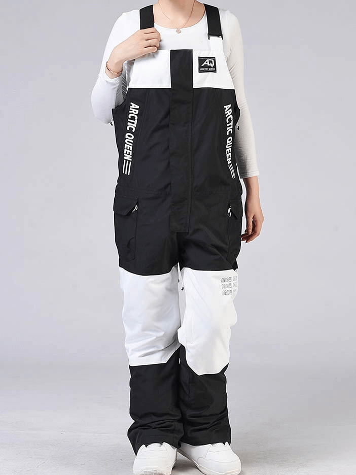 Person wearing warm waterproof zipper strap snowboarding pants, black and white winter ski jumpsuit, perfect for skiing and snowboarding.