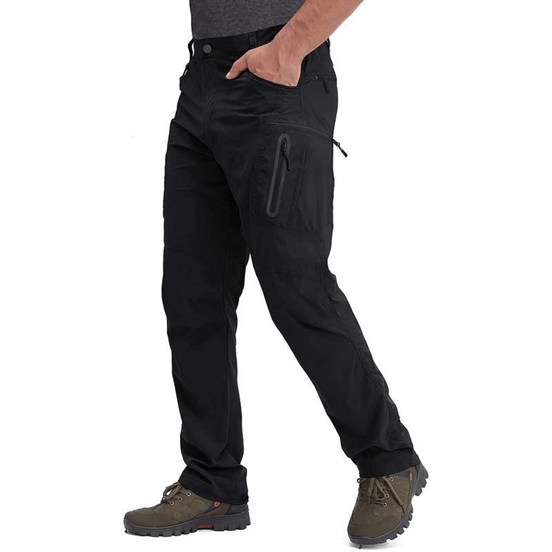Man wearing black water resistant lightweight fishing pants SF0393 with zipper pockets, ideal for outdoor trips.