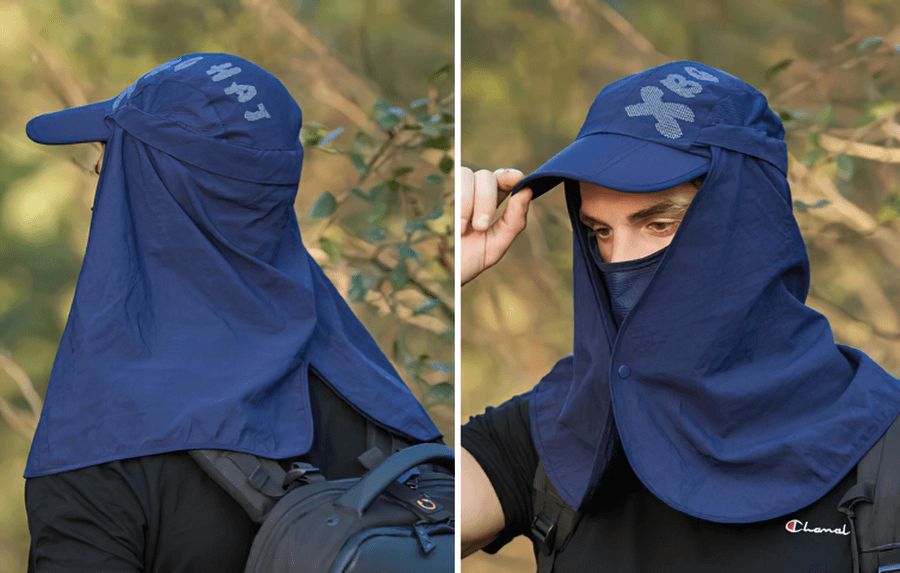 Man wearing a waterproof blue sun hat with neck flap and visor, perfect for outdoor hiking and sun protection.