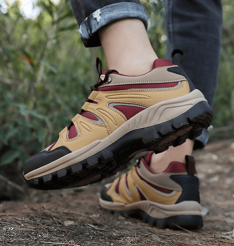 Waterproof anti-slip men's trekking shoes with rugged rubber sole, perfect for outdoor adventures.