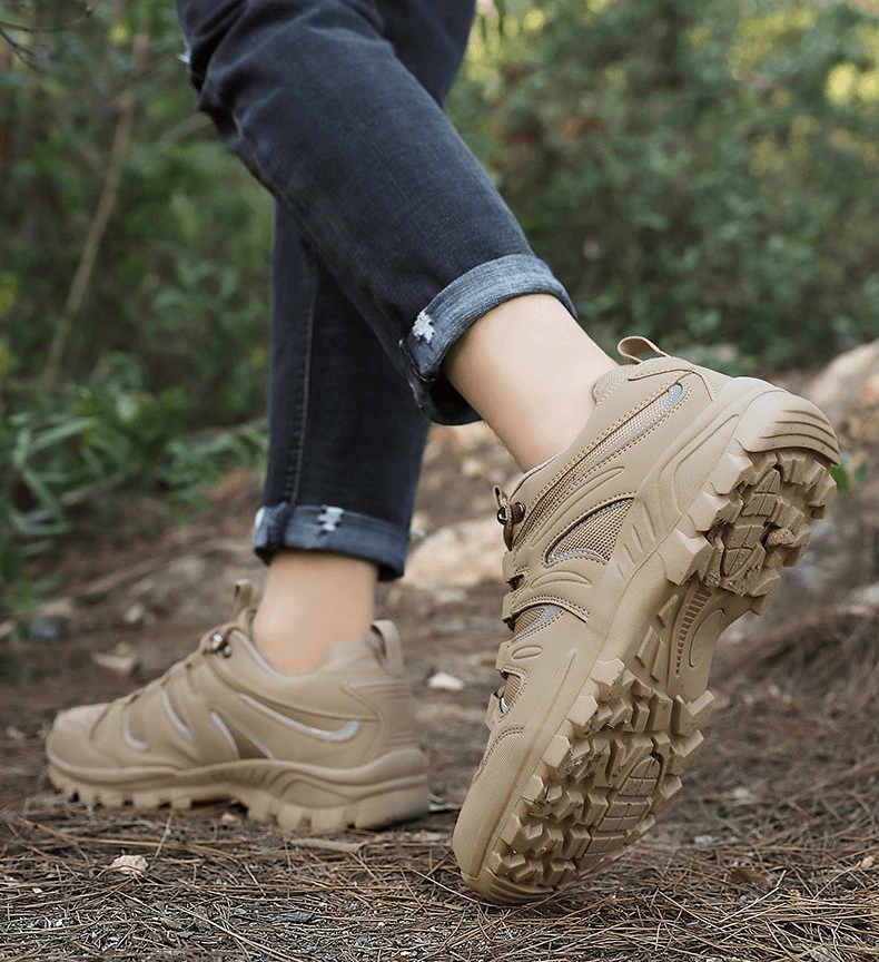 Man wearing waterproof anti-slip trekking shoes with secure grip, perfect for outdoor adventures.