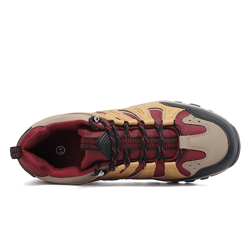 Top view of men's waterproof anti-slip trekking shoe with lace-up closure, featuring breathable nylon and rubber outsole in tan and red color.