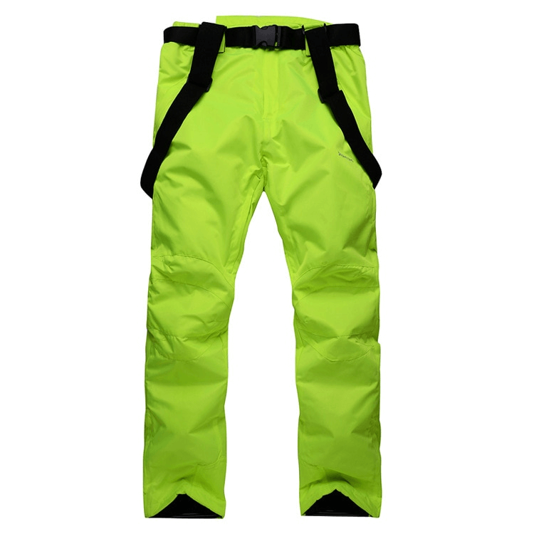 Bright green waterproof breathable insulated ski pants with suspenders, nylon polyester blend.