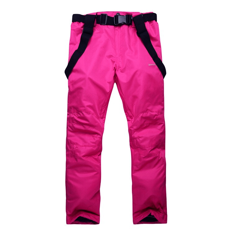 Vibrant pink waterproof breathable insulated ski pants with suspenders, perfect for warmth and comfort on the slopes.