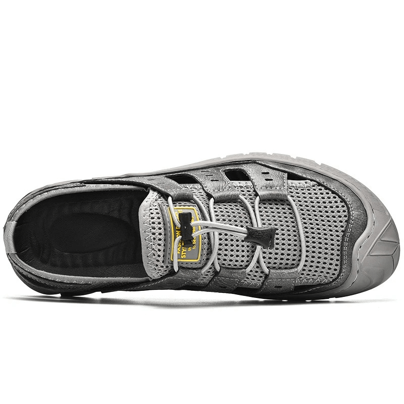 Top view of hollow-out breathable mesh sandal with wear-resistant rubber sole, air mesh upper, PU leather lining, and elastic band closure.