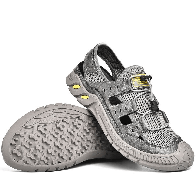 Stylish hollow-out breathable mesh sandals with wear-resistant rubber sole, featuring air mesh upper and PVC outsole for maximum comfort.