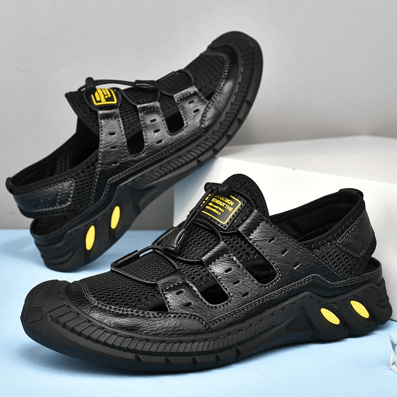 Black hollow-out breathable mesh sandals with wear-resistant rubber sole, lightweight with air mesh upper and elastic band closure.