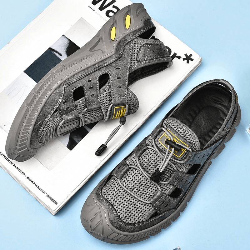 Sleek hollow-out breathable mesh sandals with wear-resistant rubber sole for comfort and style.