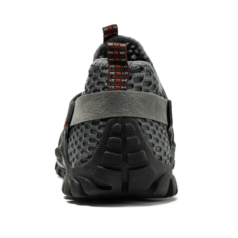 Rear view of waterproof non-slip climbing sneaker SF0579 for men, showing mesh design and rubber sole for hiking traction.