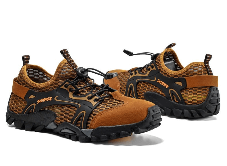 Stylish waterproof non-slip climbing sneakers for men, featuring air mesh, PU leather, and flexible rubber outsole for hiking.