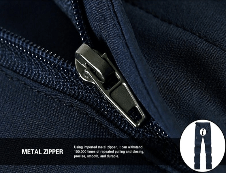 Close-up of metal zipper on waterproof quick dry breathable women's pants with pockets, highlighting durability and functionality.