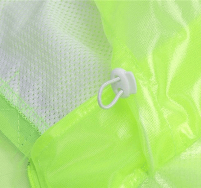 Close-up of the SF0304 waterproof reflective bike rain cover with adjustable hood, highlighting the neon green waterproof fabric and breathable mesh.