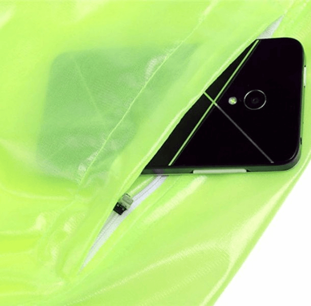 Close-up of a waterproof reflective bike rain cover pocket holding a smartphone, showcasing its protective and practical design.