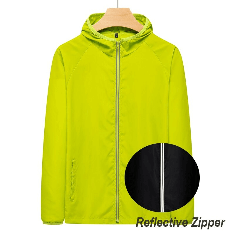 Bright green waterproof women's jacket with reflective zipper, perfect for sun protection, camping, and hiking.