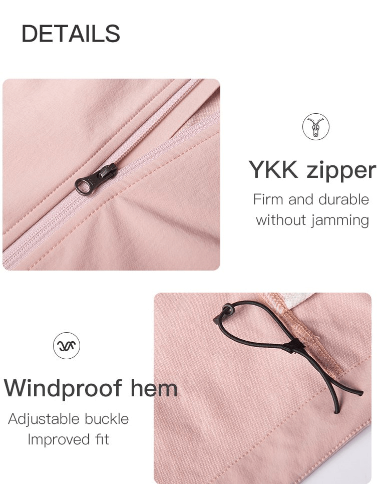 Close-up of pink waterproof sports jacket with YKK zipper and windproof hem, highlighting durable and adjustable features.
